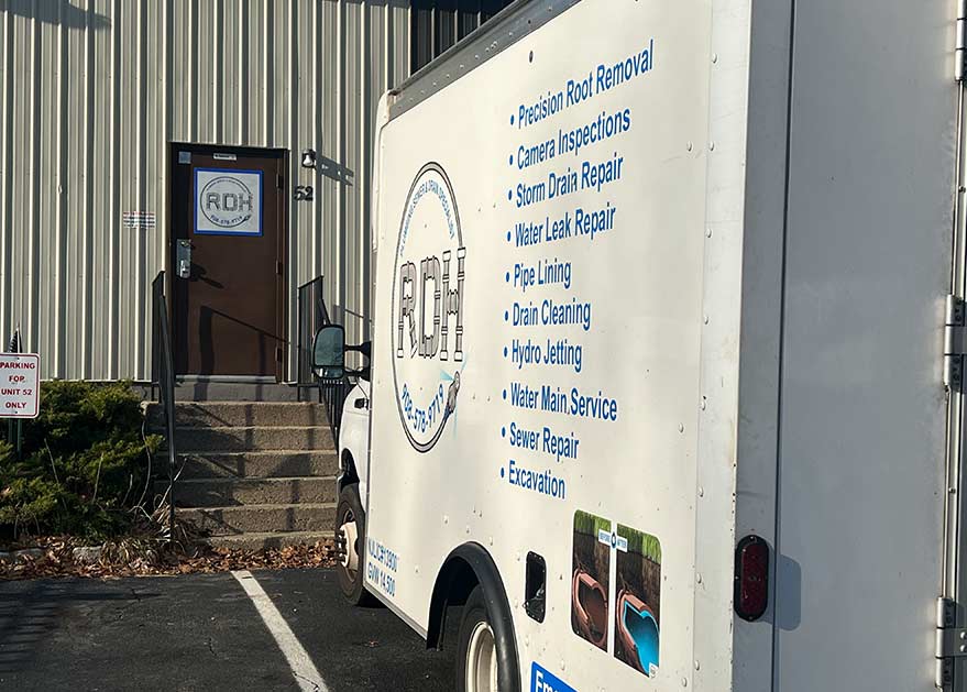 RDH Plumbing Specialist Van In Front of Office RDH Plumbing Specialist Van In Front of Office