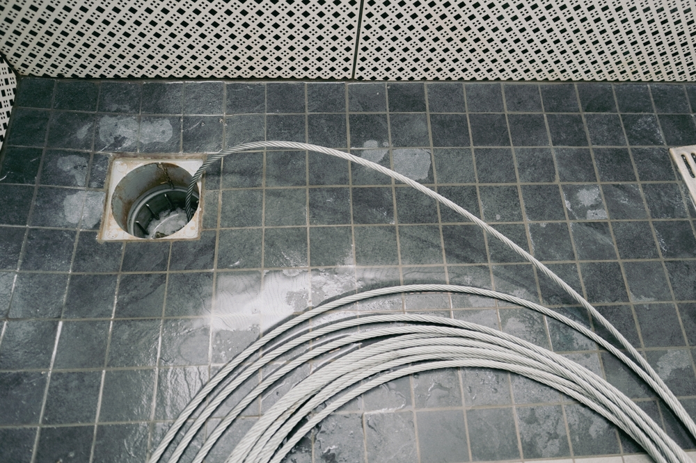 commercial floor drain snake snagging clog